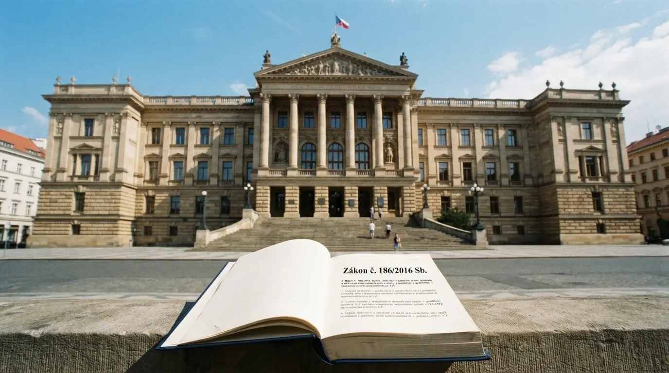 Budova Ministerstva financí ČR, v popředí úřední dokument s textem zákona č. 186/2016 Sb.